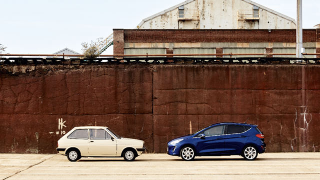 A white and blue Fiesta facing each other